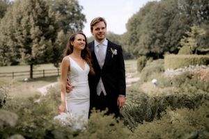 elegant bride and groom posing in their wedding day