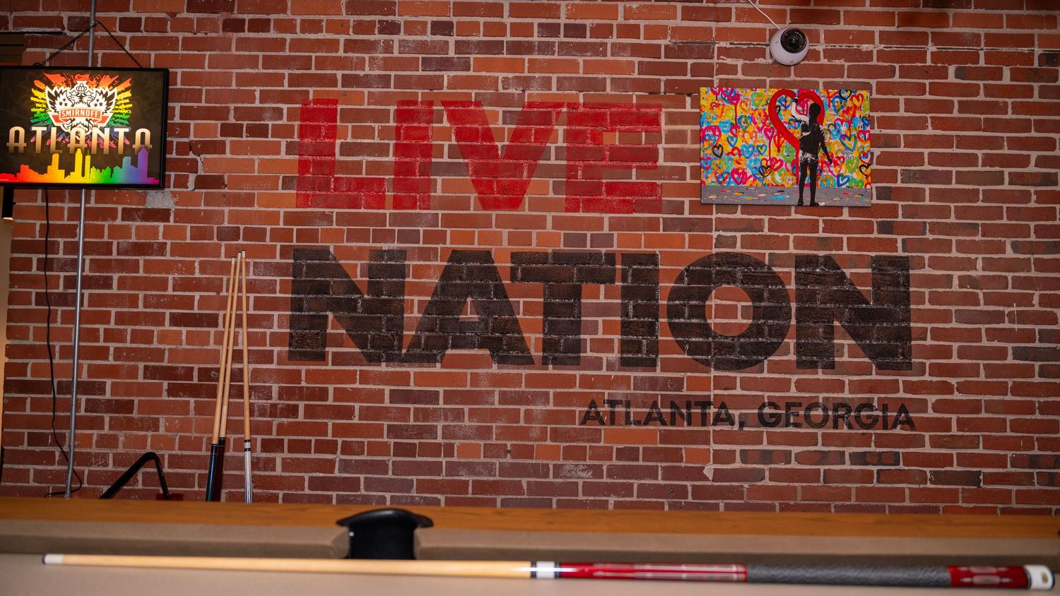 Live Nation logo painted on brick wall in Atlanta, Georgia.