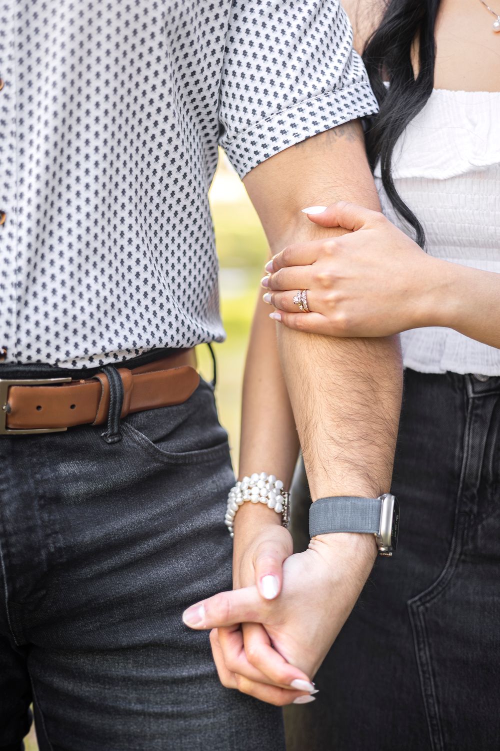 Interlocking hands Engagement Photography