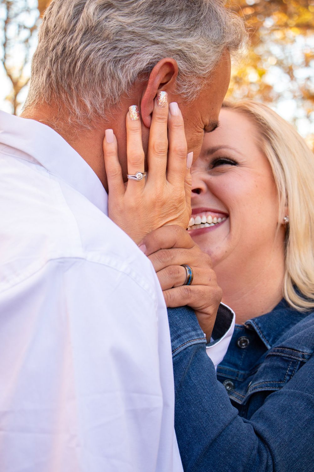 Engagement Photography with ring and embrace