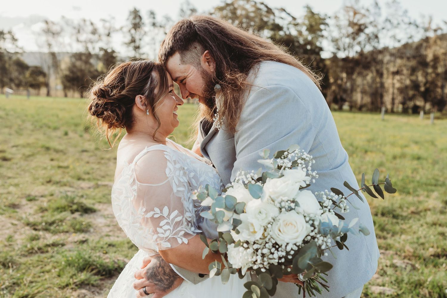 Bride and Groom at Yarramalong Valley Farmstay Central Coast Wedding embracing