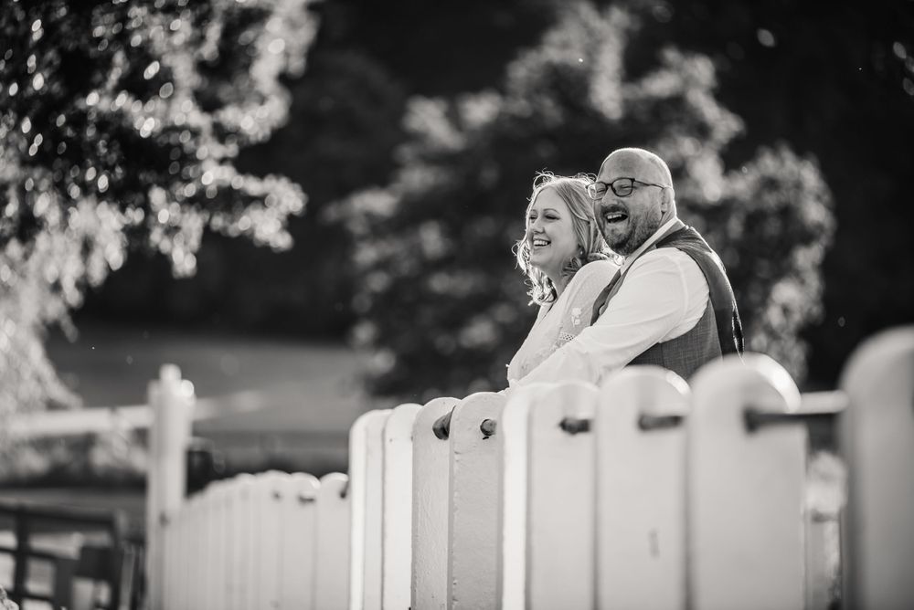 Bridge at Fonthill Estate Wedding wedding venue with lake views. Documentary wedding photographer Wiltshire, Dorset, Devon, Hampshire
