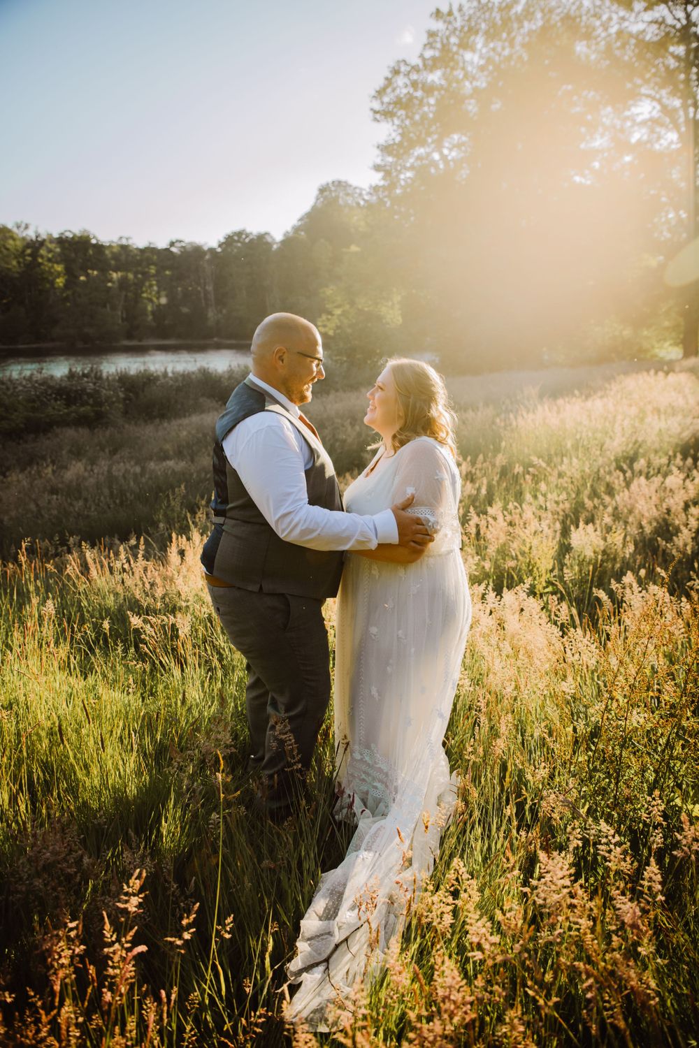 Golden hour at Fonthill Estate Wedding wedding venue with lake views. Documentary wedding photographer Wiltshire, Dorset, Devon, Hampshire