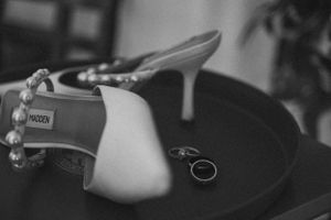 Close-up fragments of a delicate bridal portrait session in black and white.