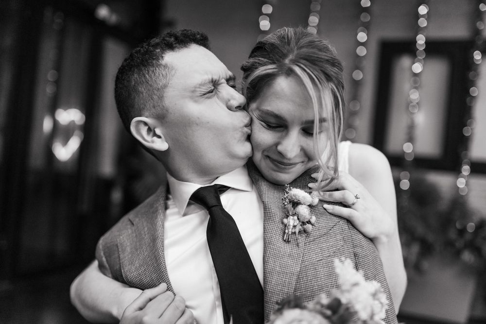 Intimate wedding couple moments captured in a series of romantic black and white photographs.