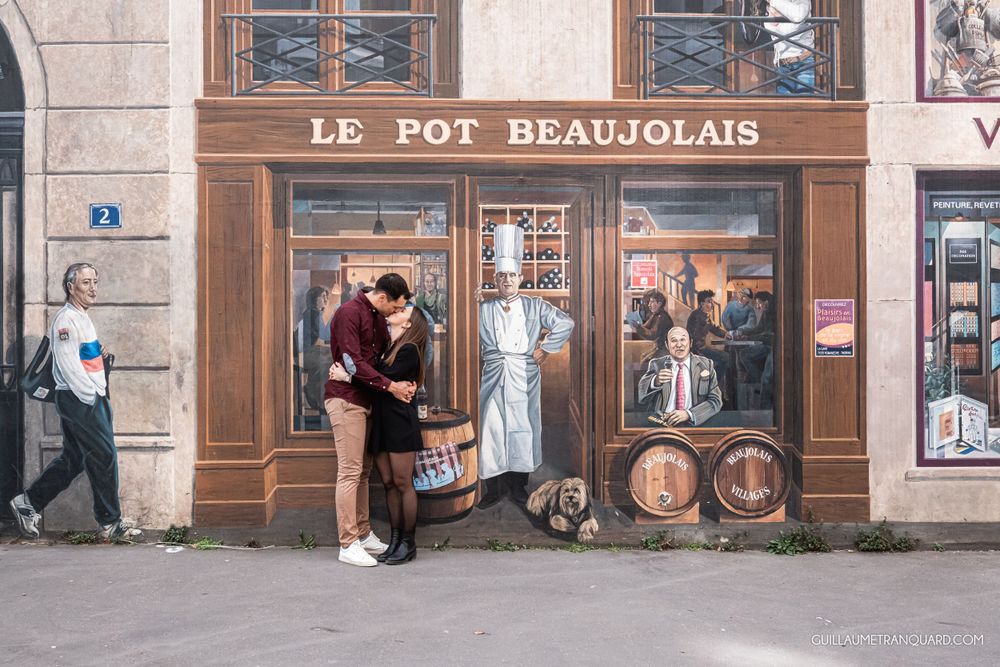 Vintage storefront of Le Pot Beaujolais restaurant with classic French architecture and signage.