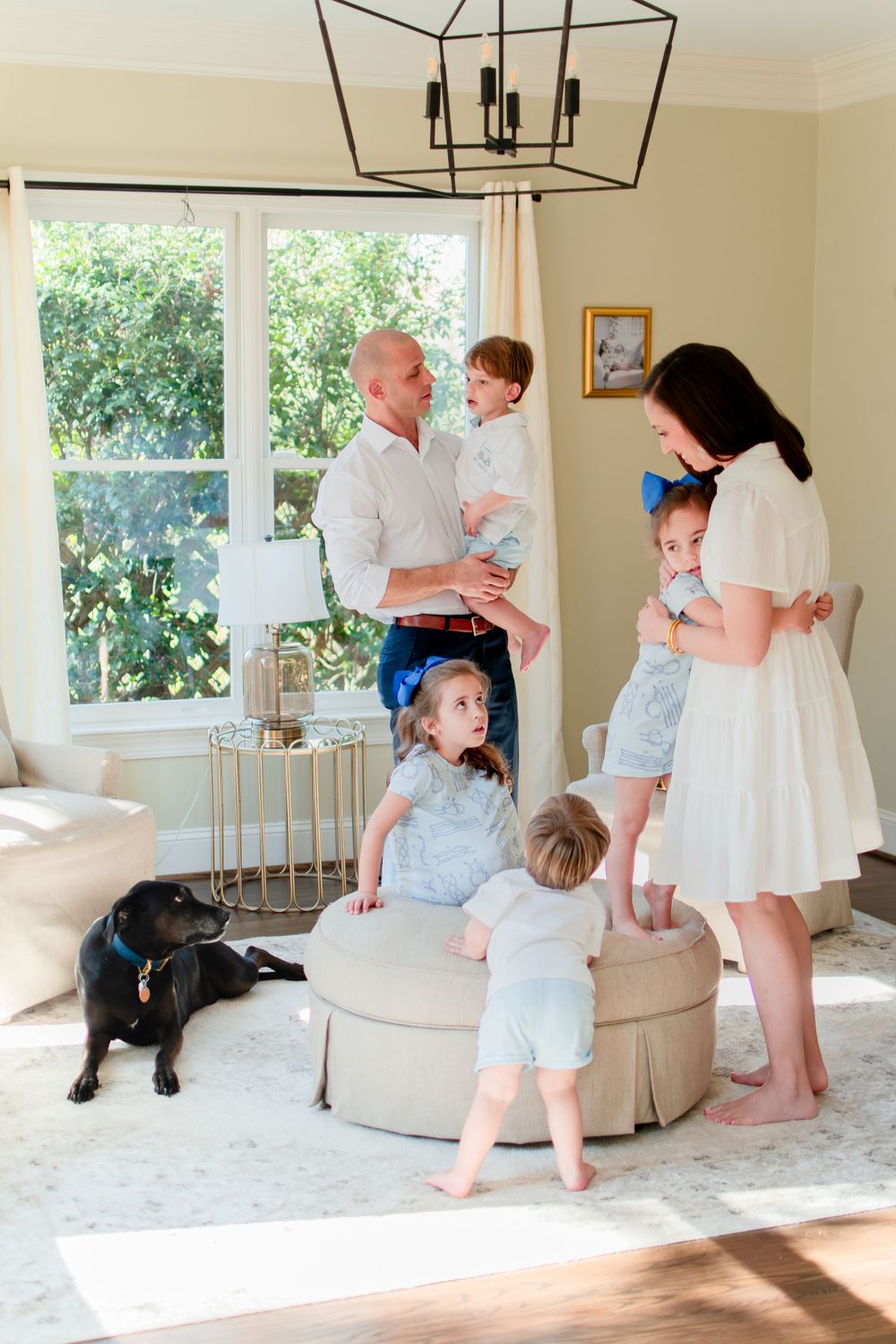 A genuine interaction between the family and their dog captured in their Winston-Salem home.