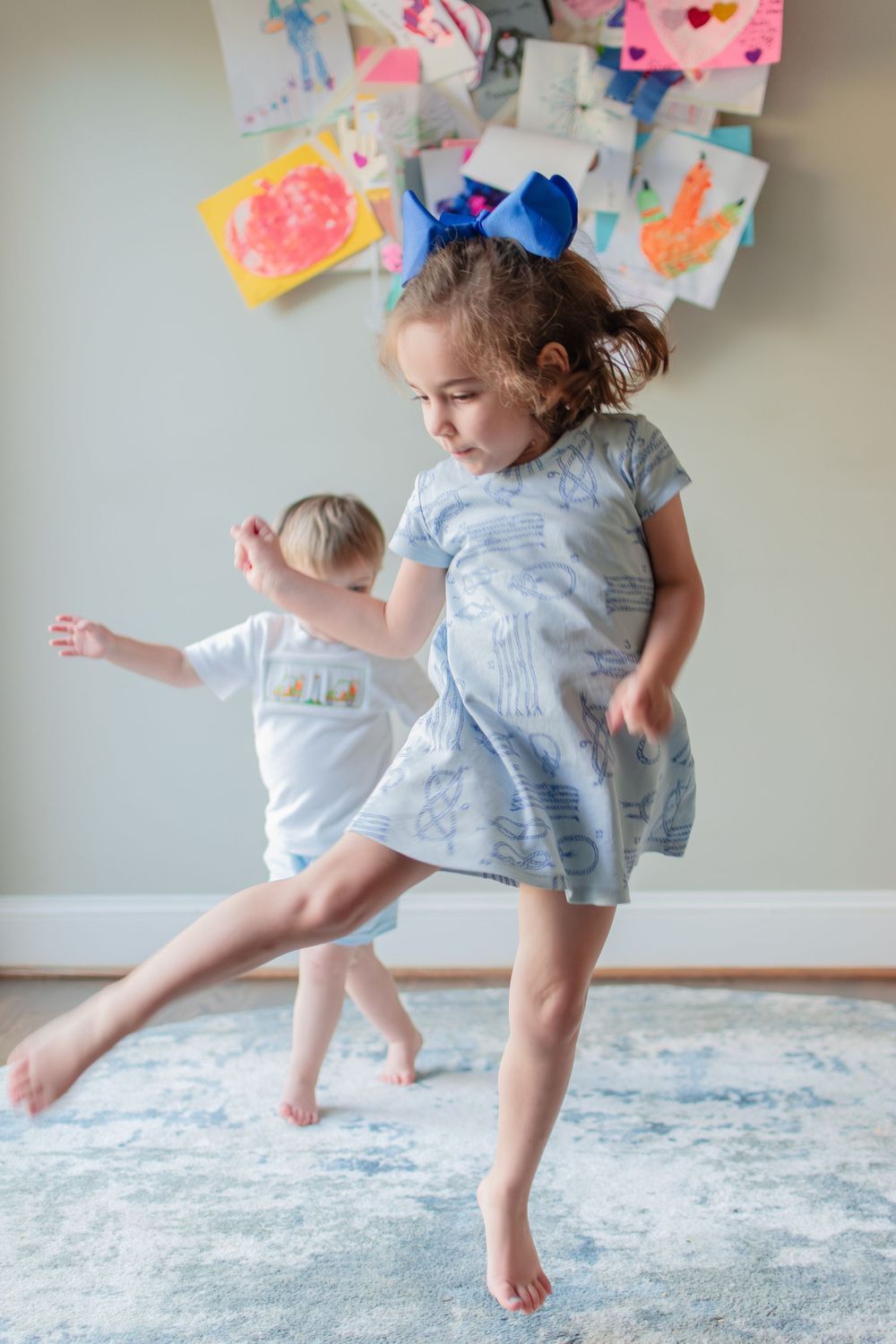 A sister and brother show off their best dance moves in their Winston-Salem home.