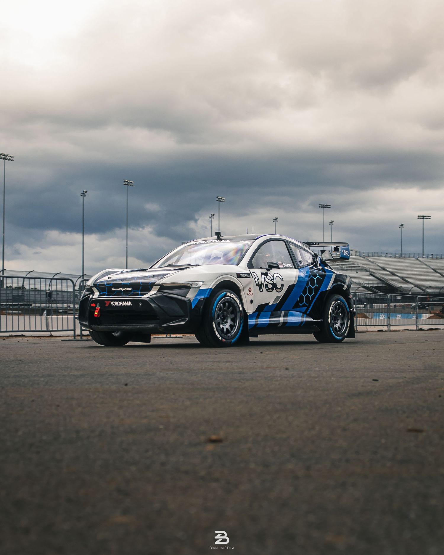 Blue Dodge Hornet rally car on dirt track at Nitrocross 2024