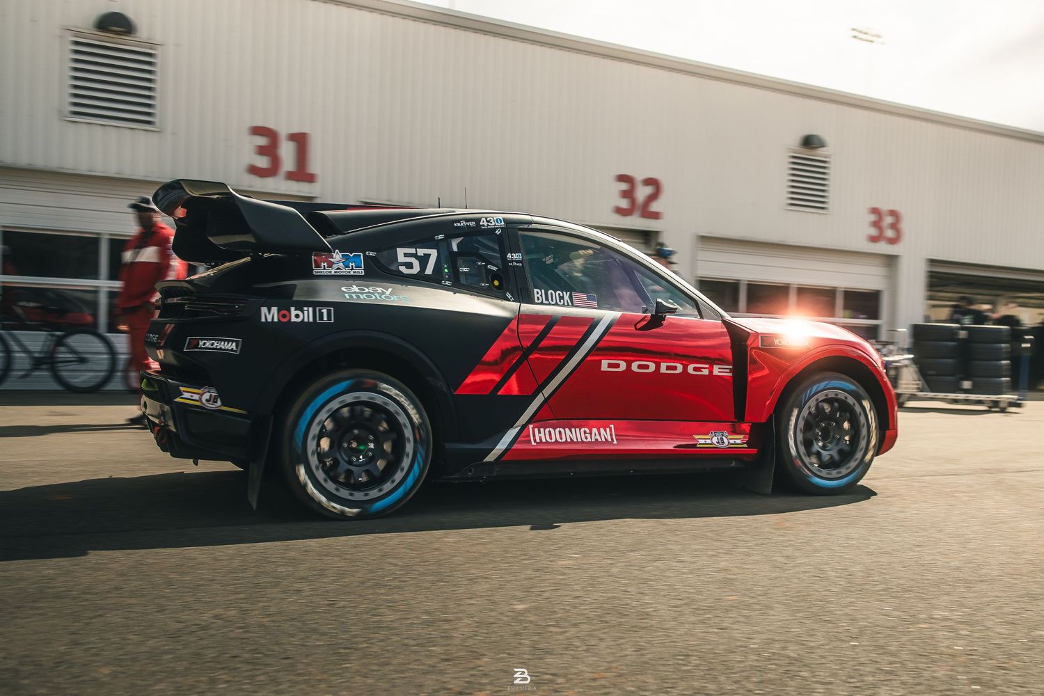 Lia Block’s red Dodge Hornet heading to the rally track at Nitrocross 2024