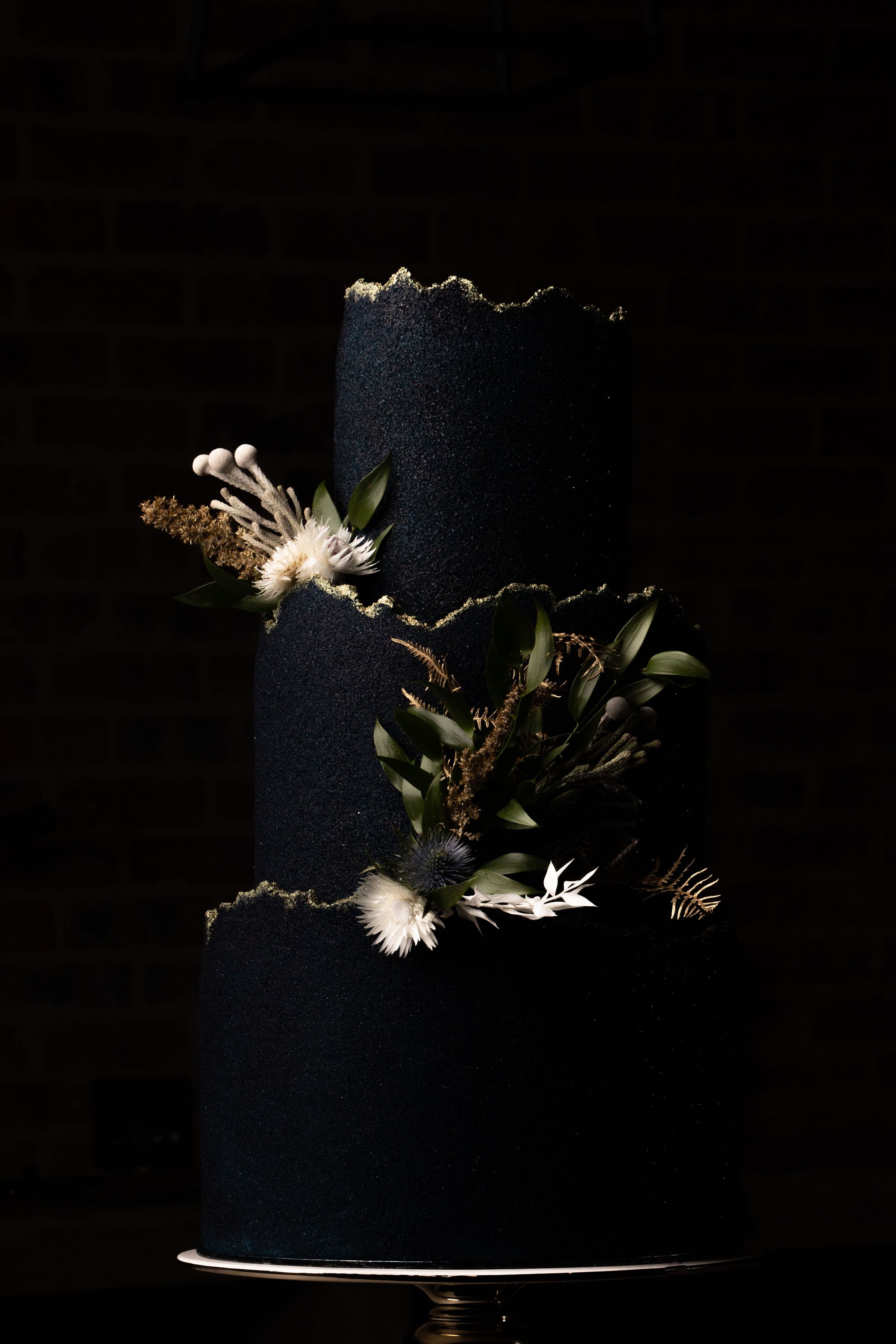 Close-up of wedding cake with intricate