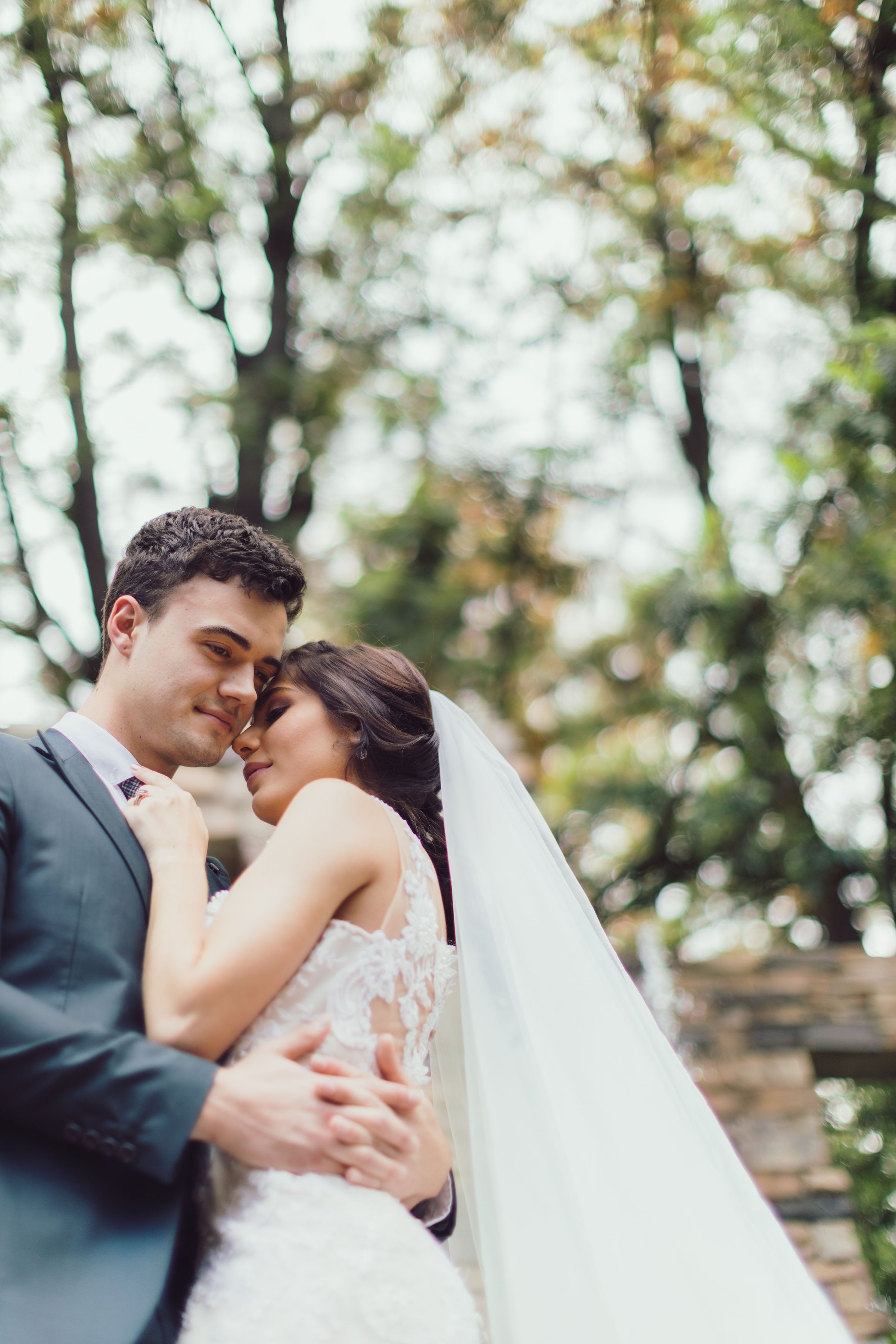 Close-up of couple exchanging smiles during an intimate photo session