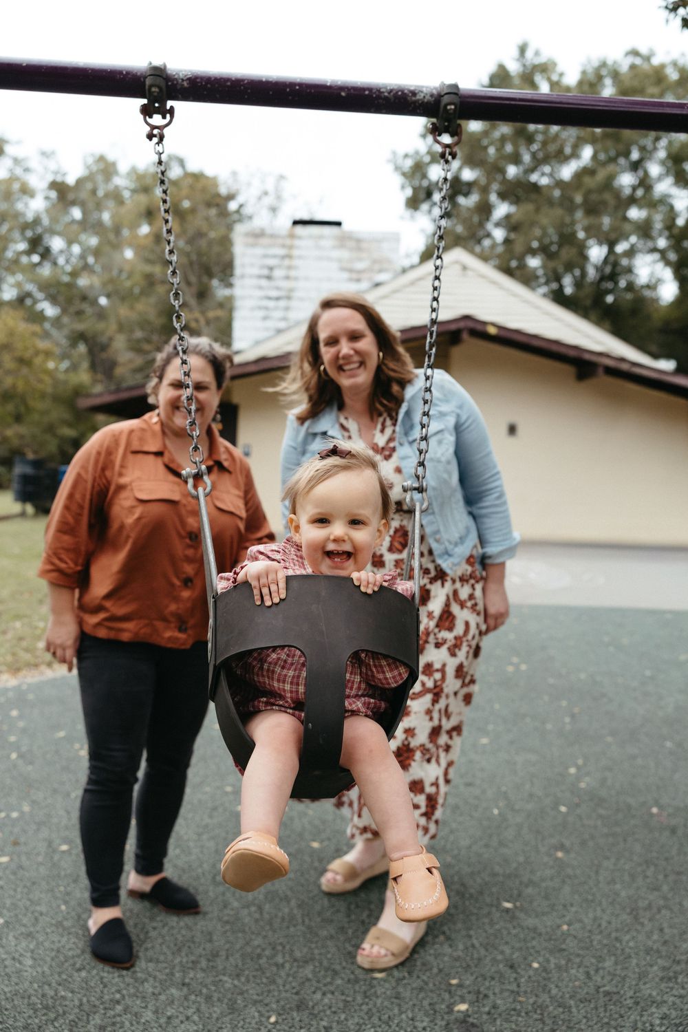 A playful sequence of swing photos at a playground shows joyful moments between family members on a sunny day.