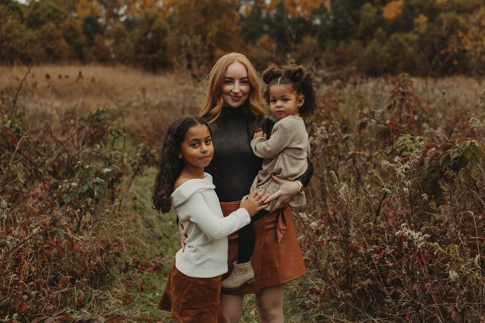 A series of autumn outdoor family photos showing tender moments between parents and children in a rustic setting.