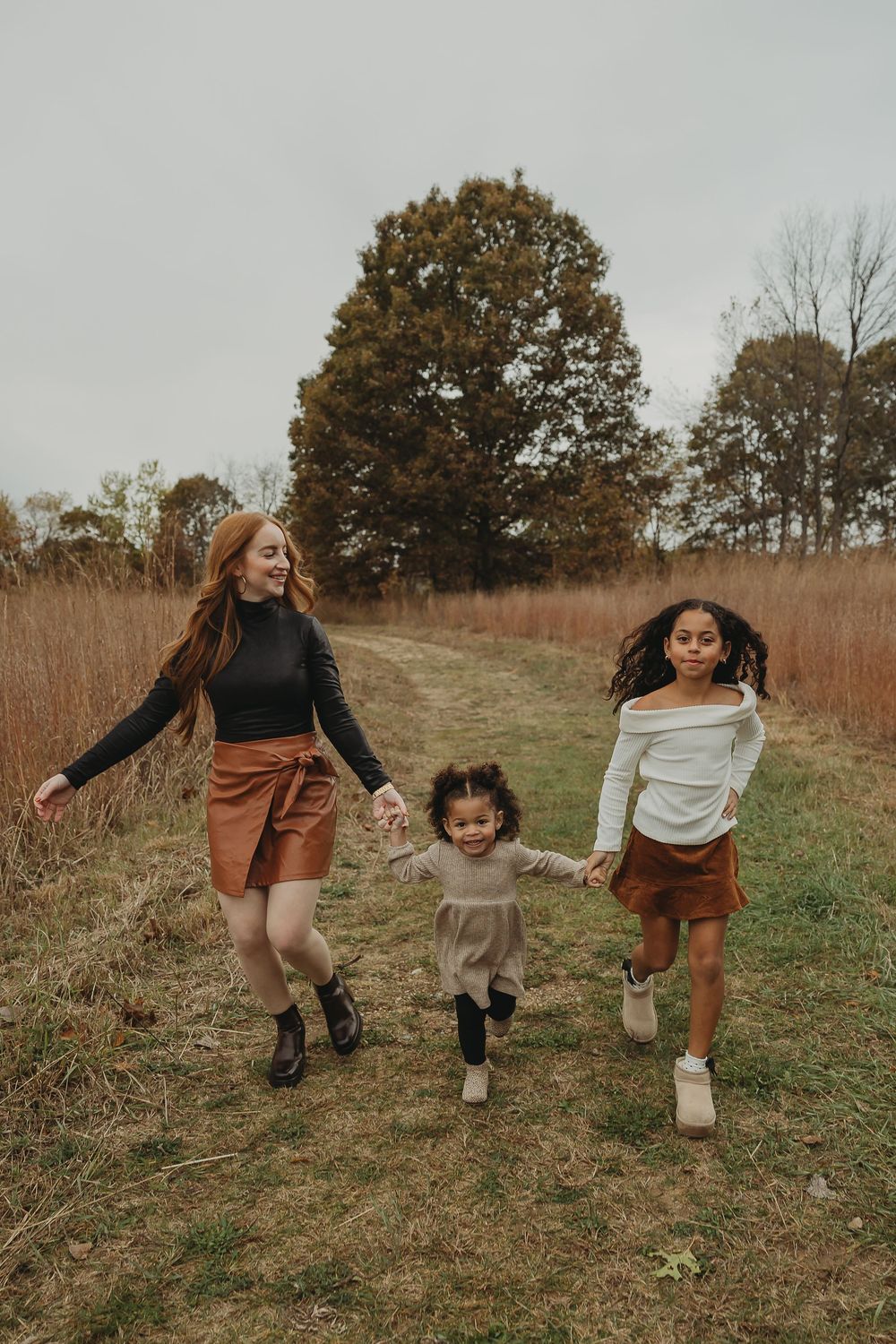 Candid moments captured of playful running and movement in a natural field setting during golden hour.