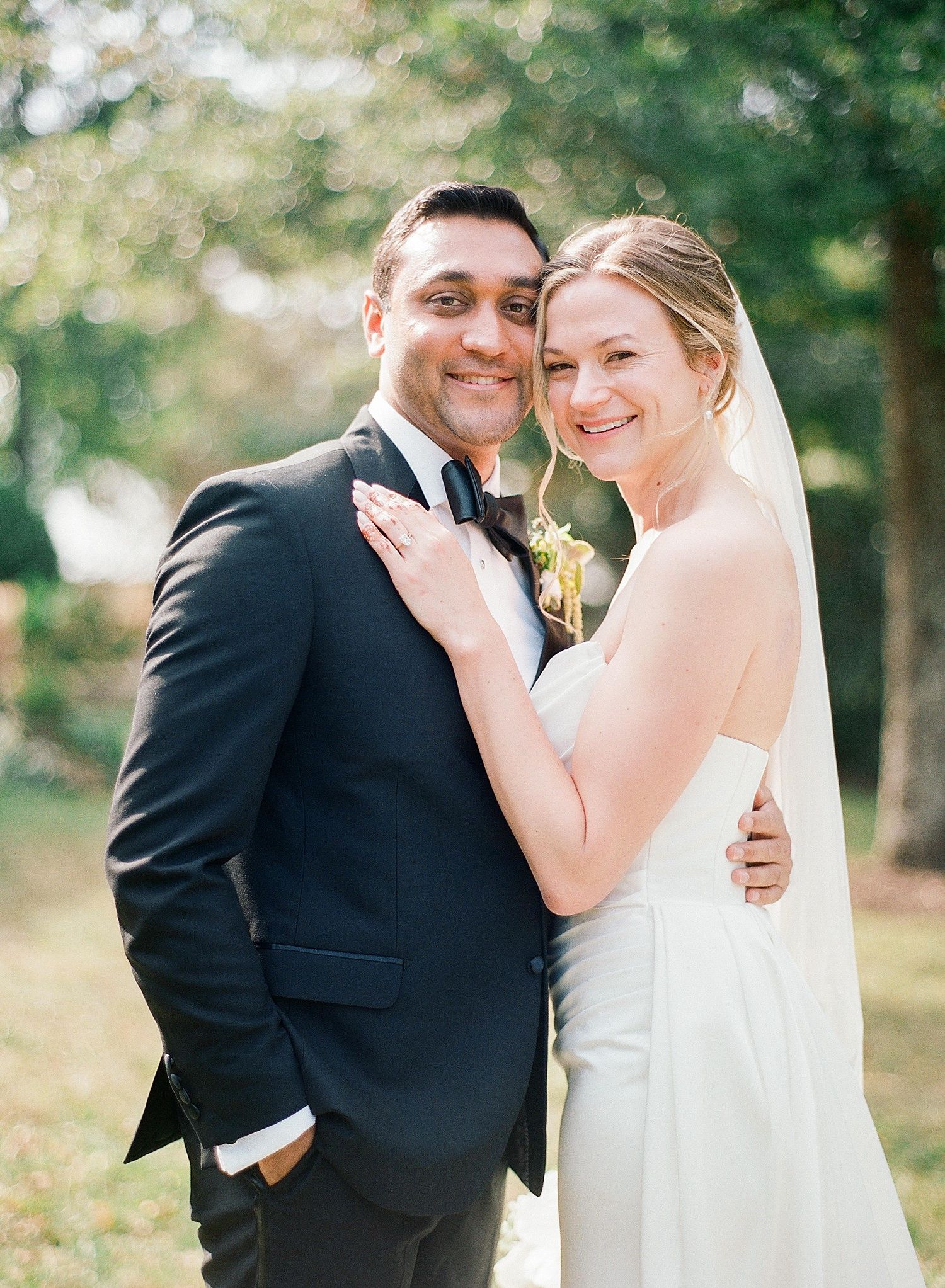 A series of romantic outdoor wedding portraits showing a couple embracing in a sunlit garden setting.