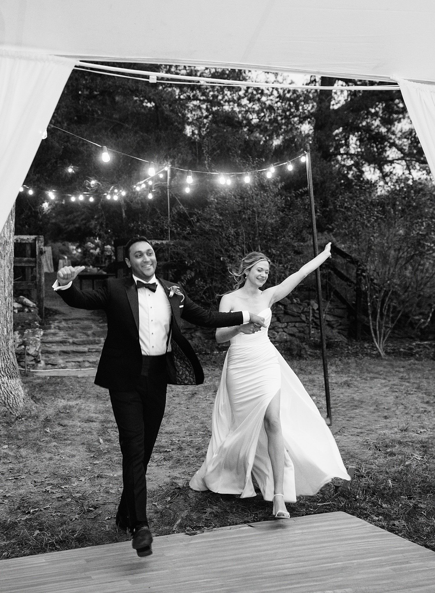 A sequence of black and white photos showing a couple joyfully dancing and twirling on an outdoor deck at dusk.