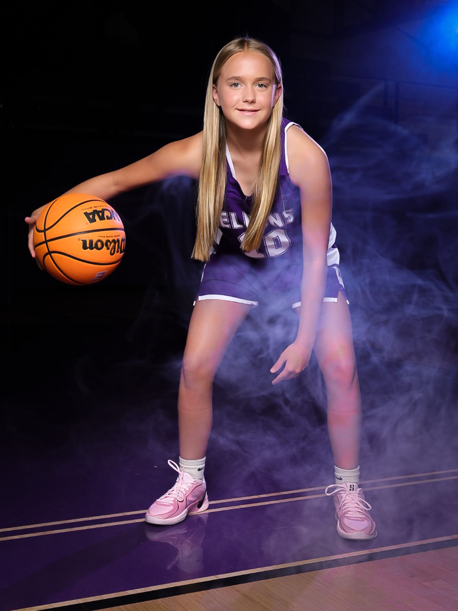 Elkins AR basketball athlete dribbling on court – Elkins Elks sports portrait.