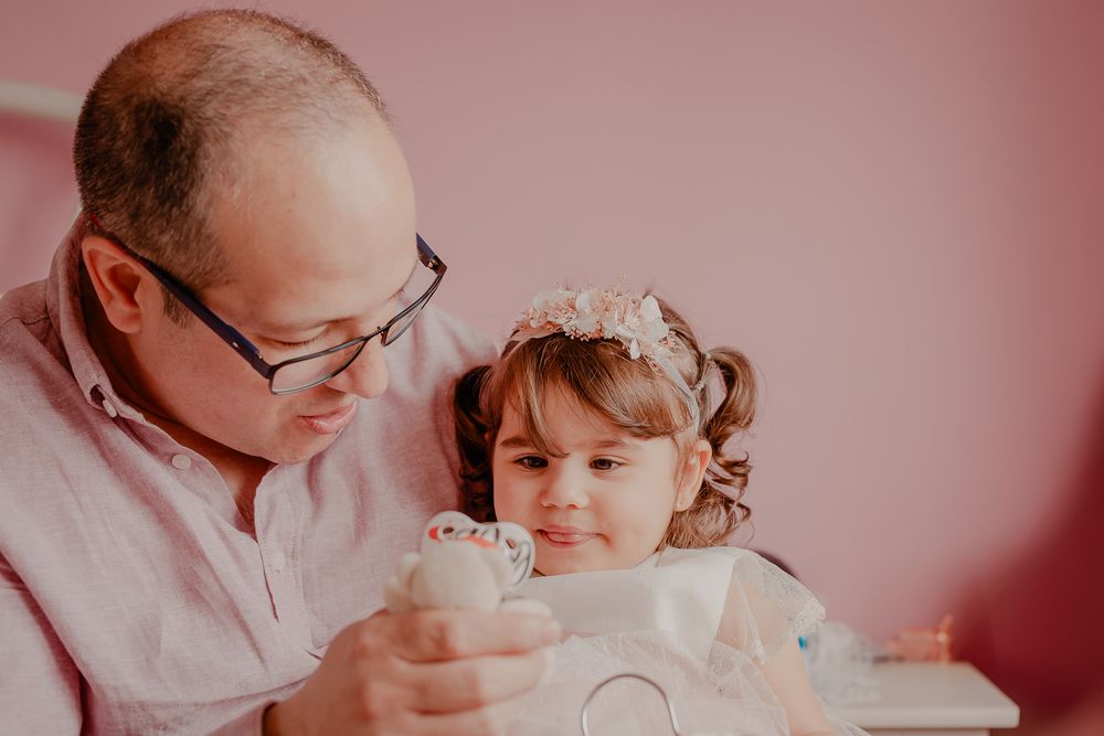 An intimate indoor portrait during a special religious celebration.