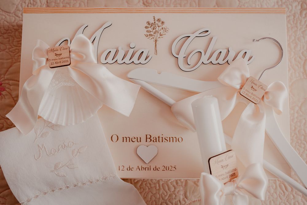 Elegant white baptism invitation with decorative text and lace details.
