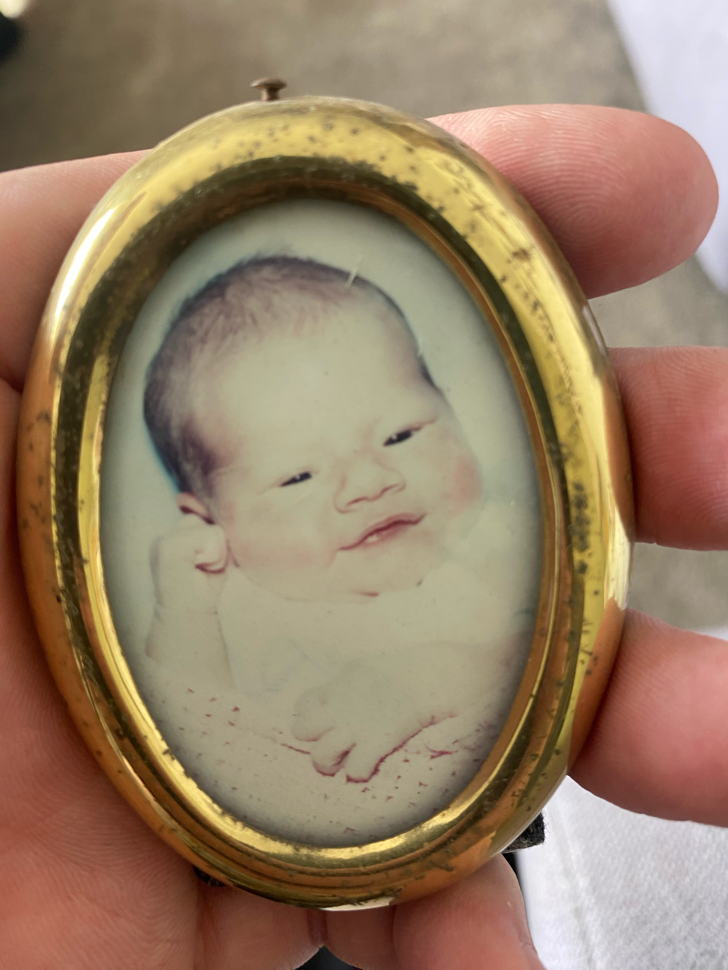Five sequential photos showing an antique gold locket with a vintage portrait miniature inside, displayed at different angles.