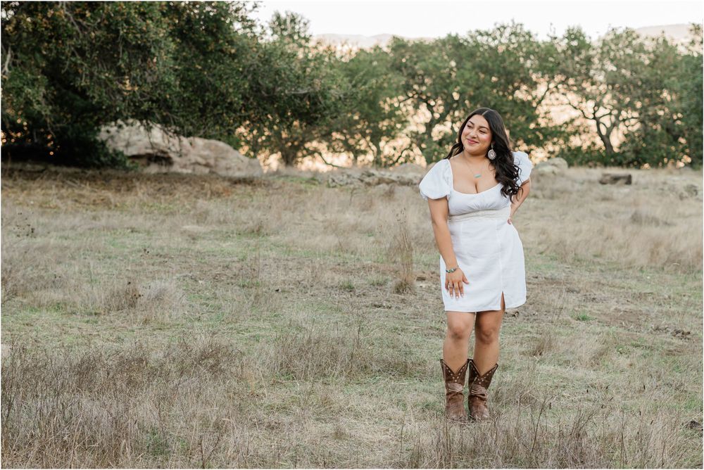 senior photos with slo high senior in white dress and boots at bishop's peak, Atascadero and arroyo grande senior photographer, slo county