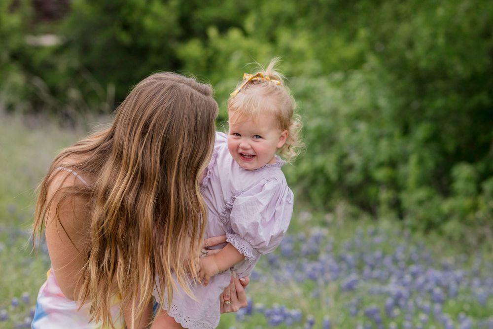 Mom and daughter in bluebonnets. Brushy Creek Lake Park Bluebonnet Mini Session 2025 Book online
