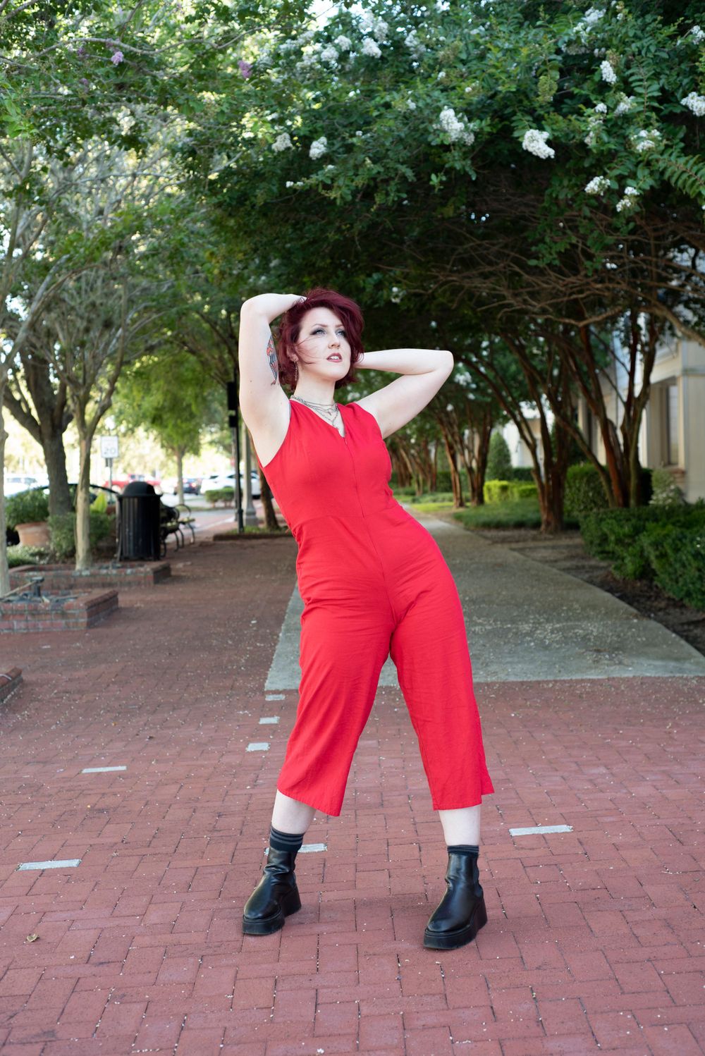 Solo female fashion session for dramatic pose. Natural afternoon soft lighting in Oviedo at Oviedo on the park.