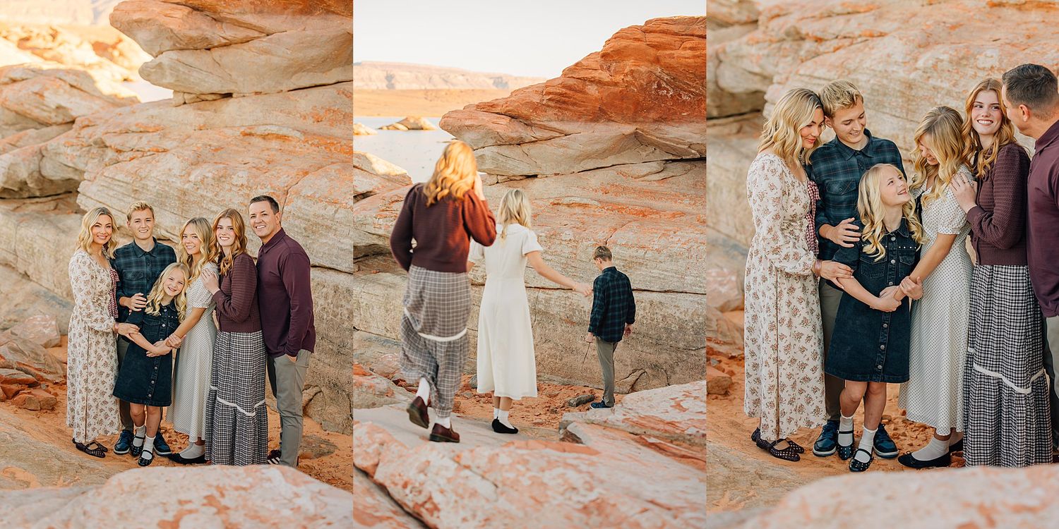 Family posing together on red rock desert landscape during golden hour outdoor photo session.
