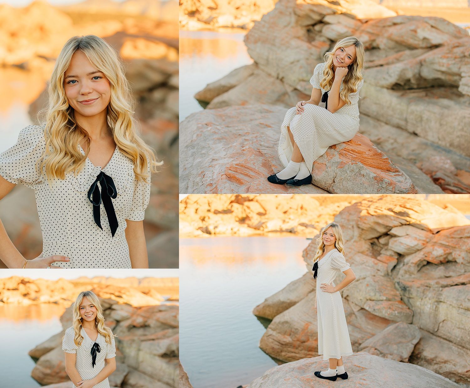 Blonde teenage girl poses on golden sandstone rocks near water in a white dress and polka dot top for senior portraits.