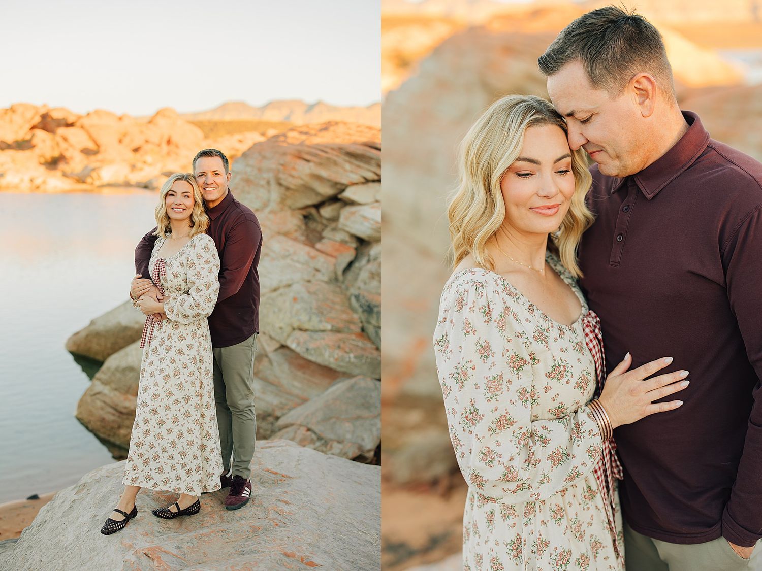 Couple embracing on rocky shore at golden hour, woman in floral dress, man in burgundy shirt, desert lake backdrop.