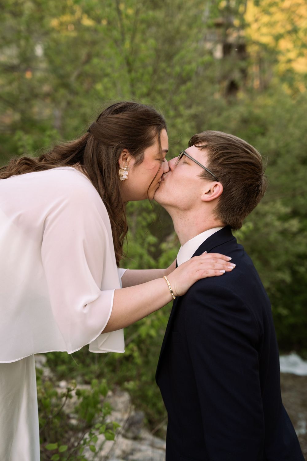 ©AnnaVonRiesenPhotography Bridal Portraits | Color image of a couple smiling at each other.