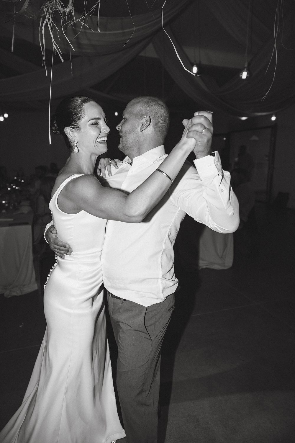 Bride and groom sharing first dance during elegant Cape Winelands wedding