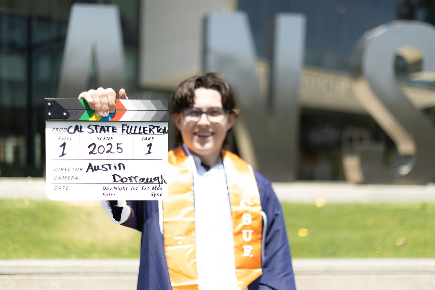A prop is in focus during the photo session at Cal State Fullerton. Making a unique photo for the graduation session.