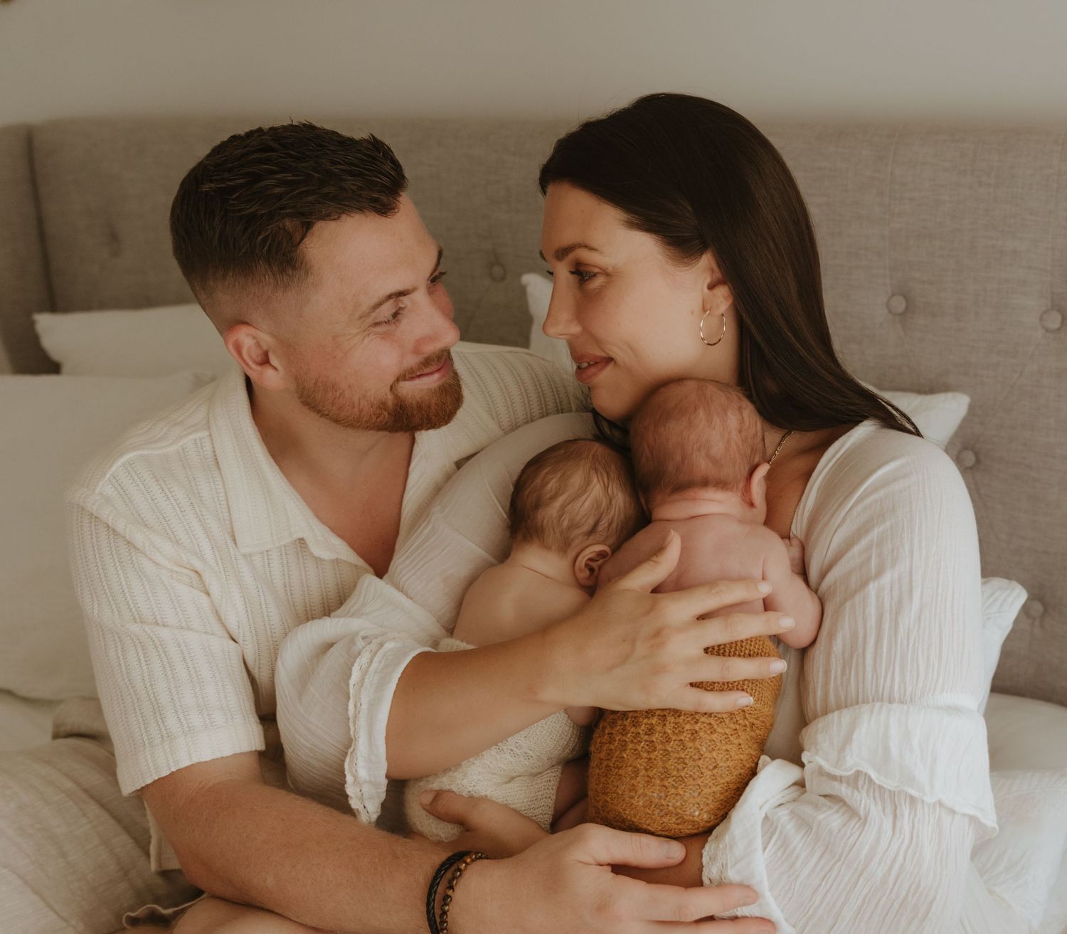 Candid natural style in home photography of newborn twins, taken in home in Lake Macquarie NSW