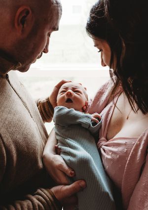 newborn couple mom and dad baby