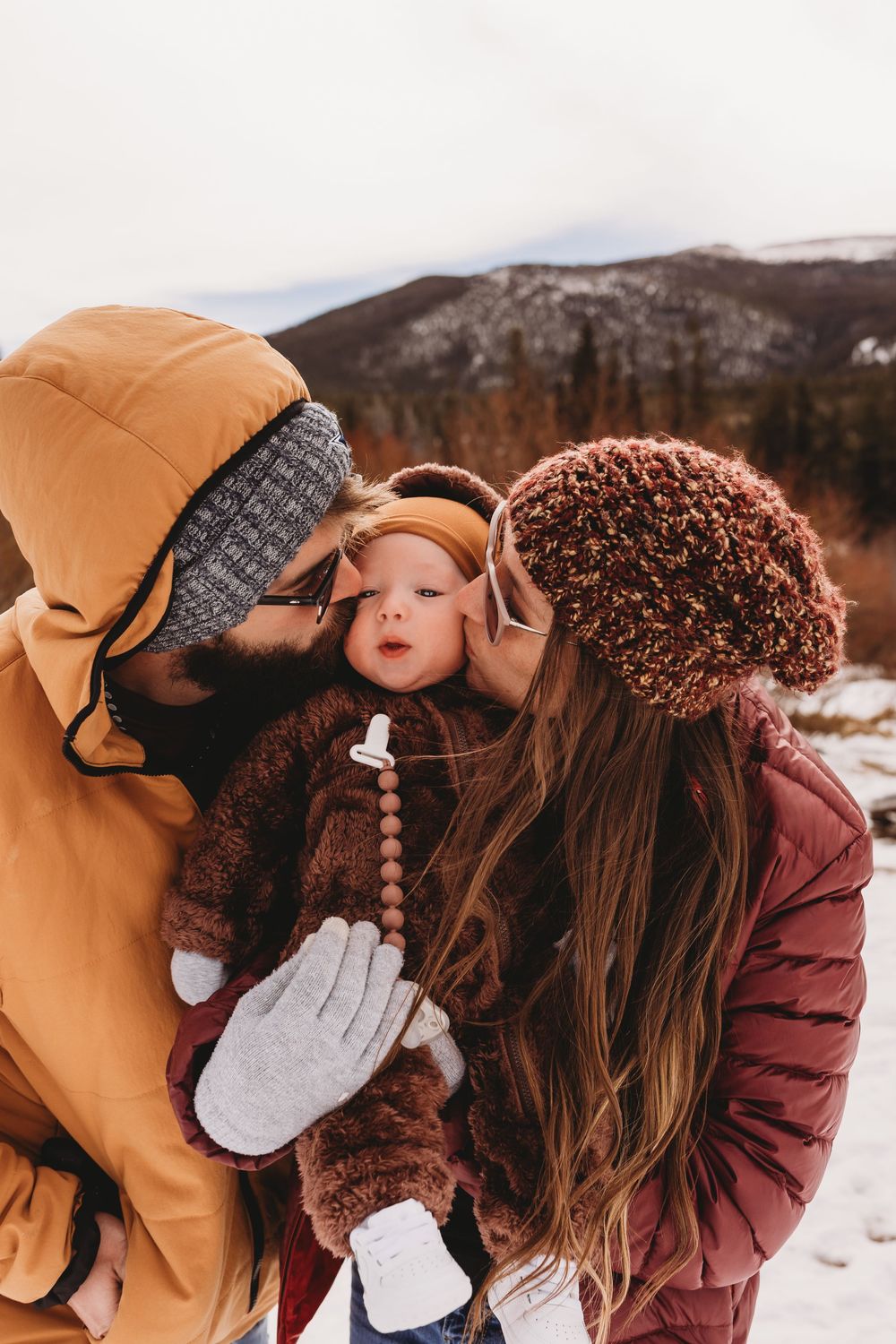 Colorado hiking mountains  couple smiles golden sun baby family kisses
