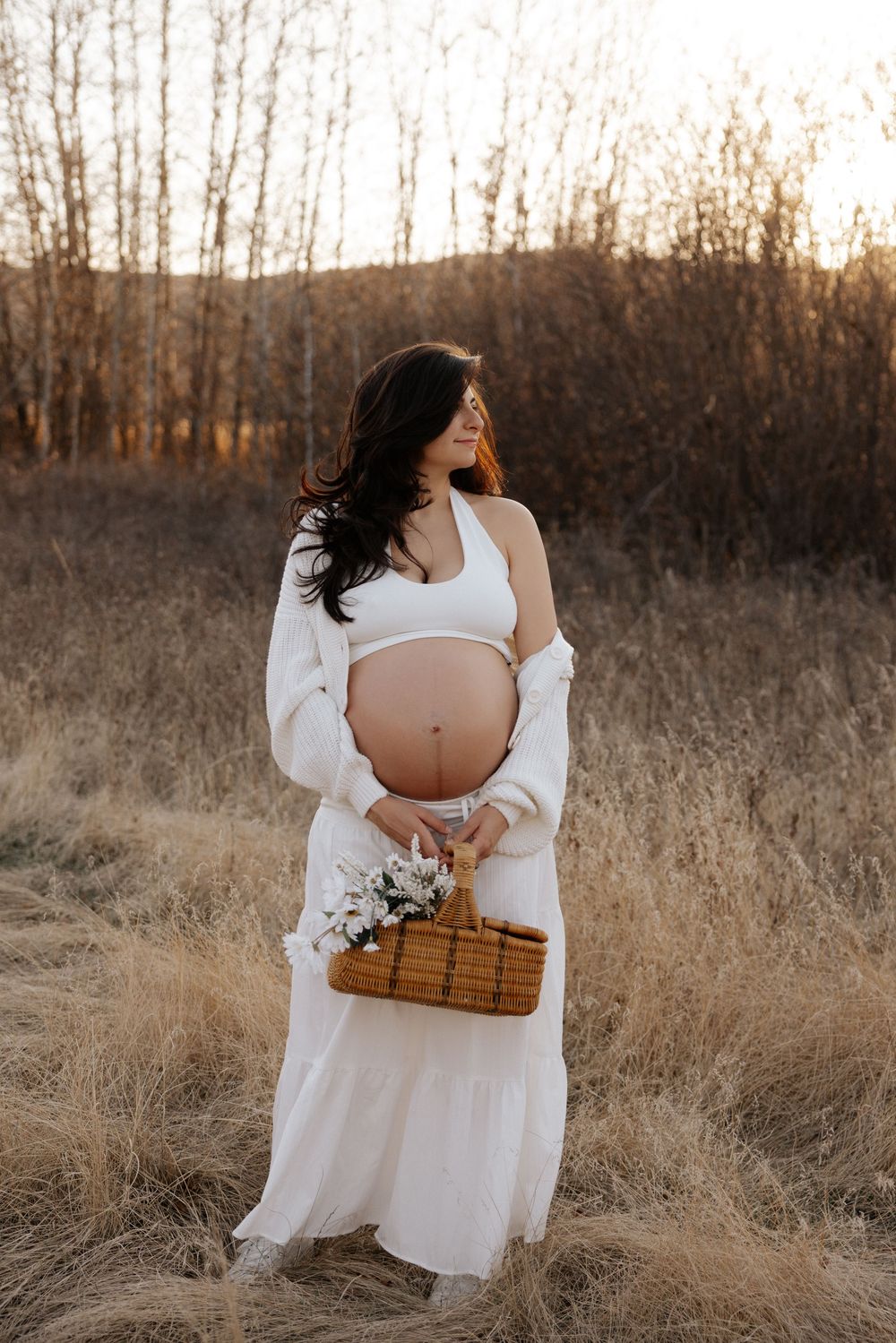 Pregnant woman in beautiful location in calgary alberta