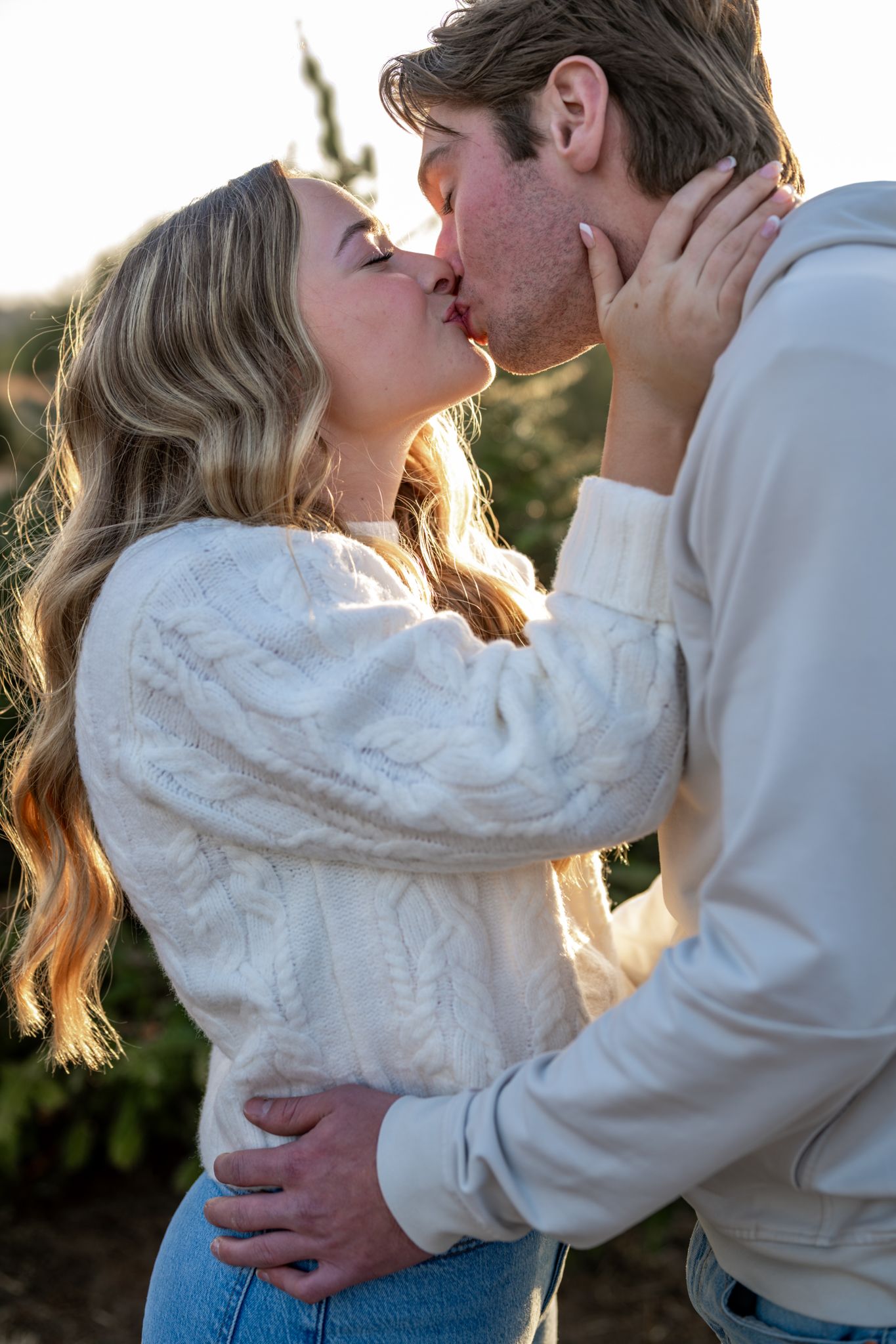 A couple kissing.