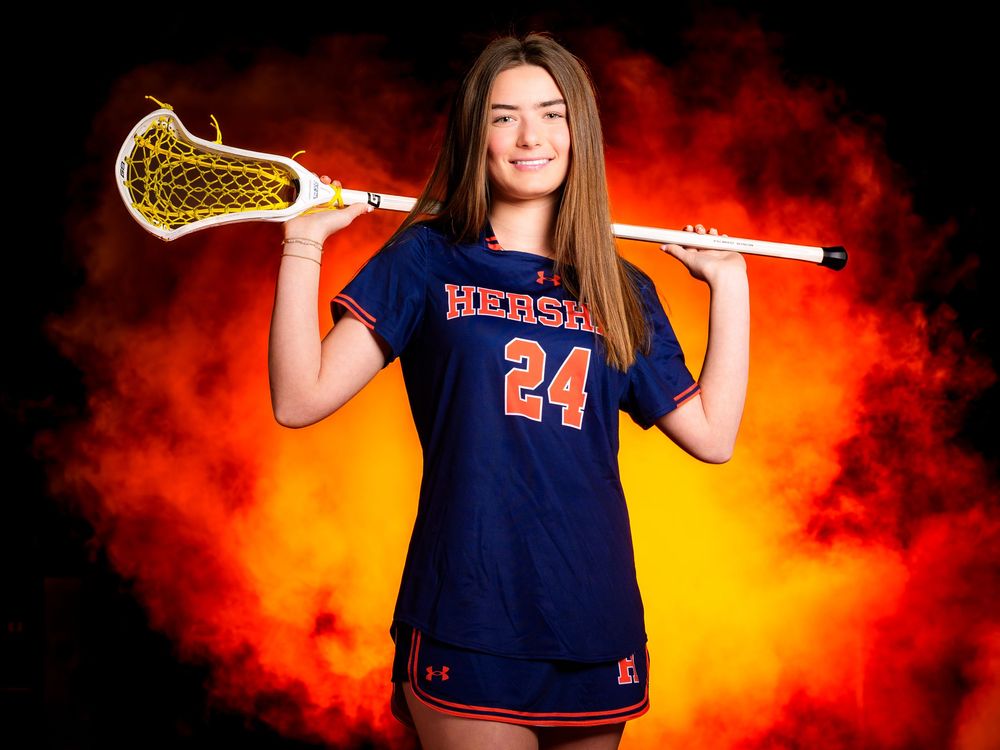 Hershey Lacrosse senior #24 holds stick over shoulder at Media Day by Deanna Fox, SportsFox Photography based in Hershey PA