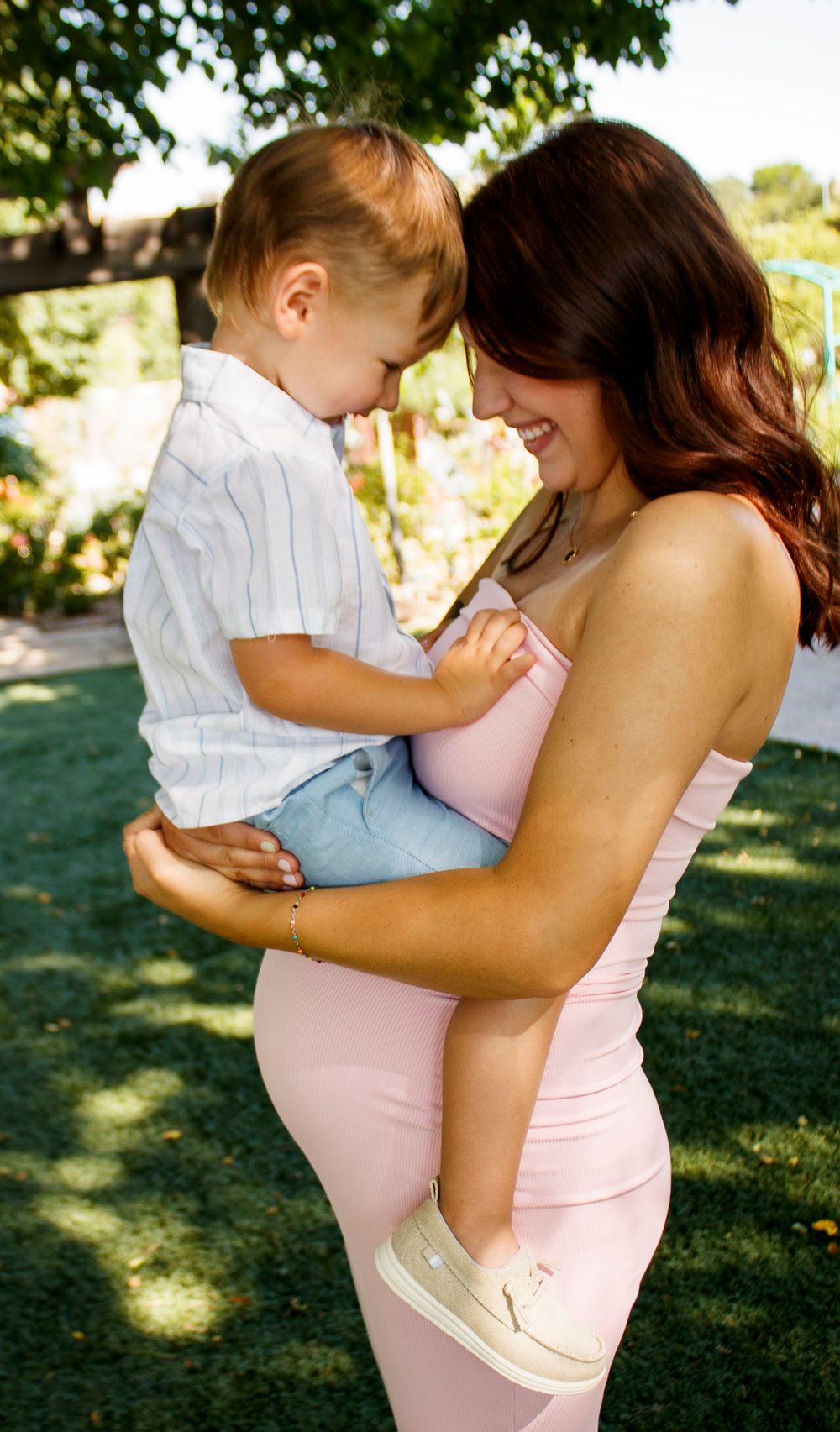 A mother and son during a maternity photo session at the Botanical Gardens in Amarillo, Texas