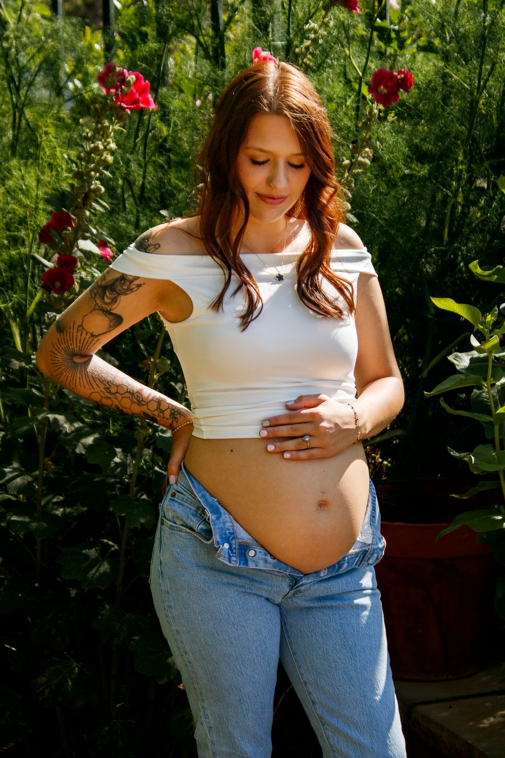 An expecting mother during a maternity photo session at the Botanical Gardens in Amarillo, Texas