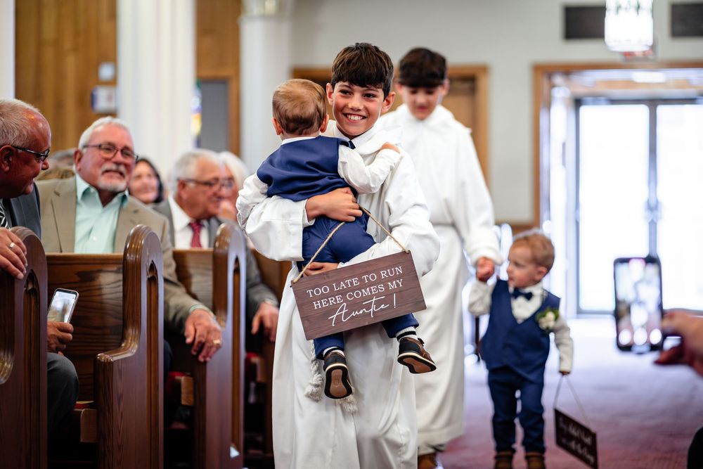 Wedding ceremony moments captured in traditional church setting with wooden pews.