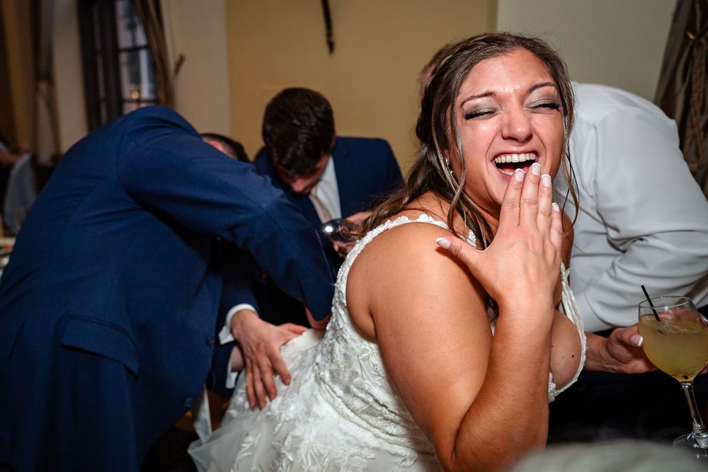 Joyful moments captured during wedding reception festivities.