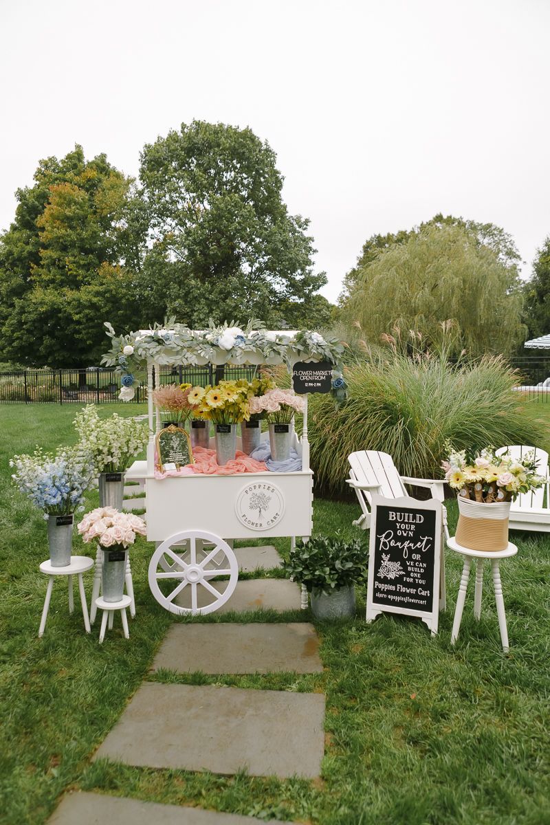 Flower cart for creating your own bouquet in the backyard, captured by NYC family photographer Paula Ortiz