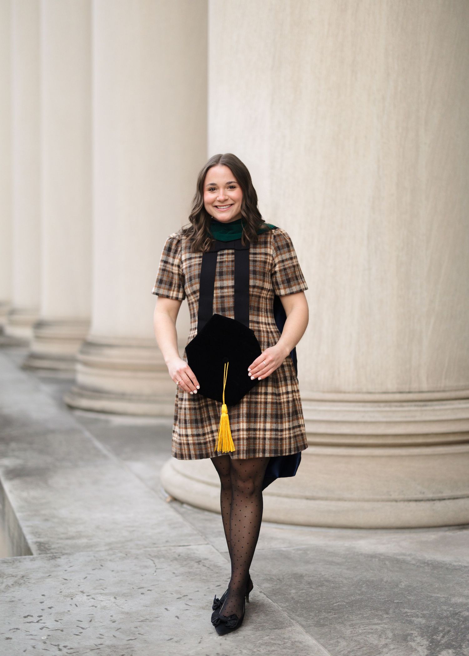 A sequence of photos showing a person in a plaid jacket and dark tights walking in front of stone columns.