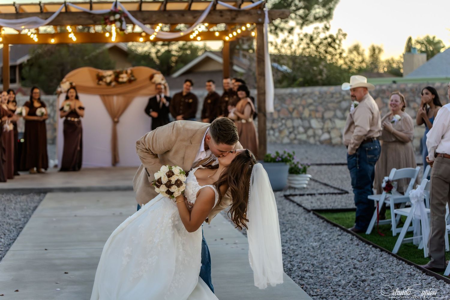 A collage of romantic wedding moments at a rustic outdoor venue during sunset.