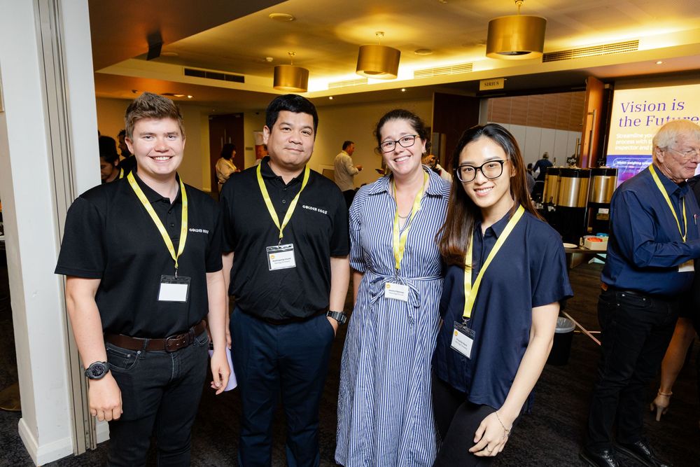 Fremantle Conference Photographer captures a group of conference attendees networking