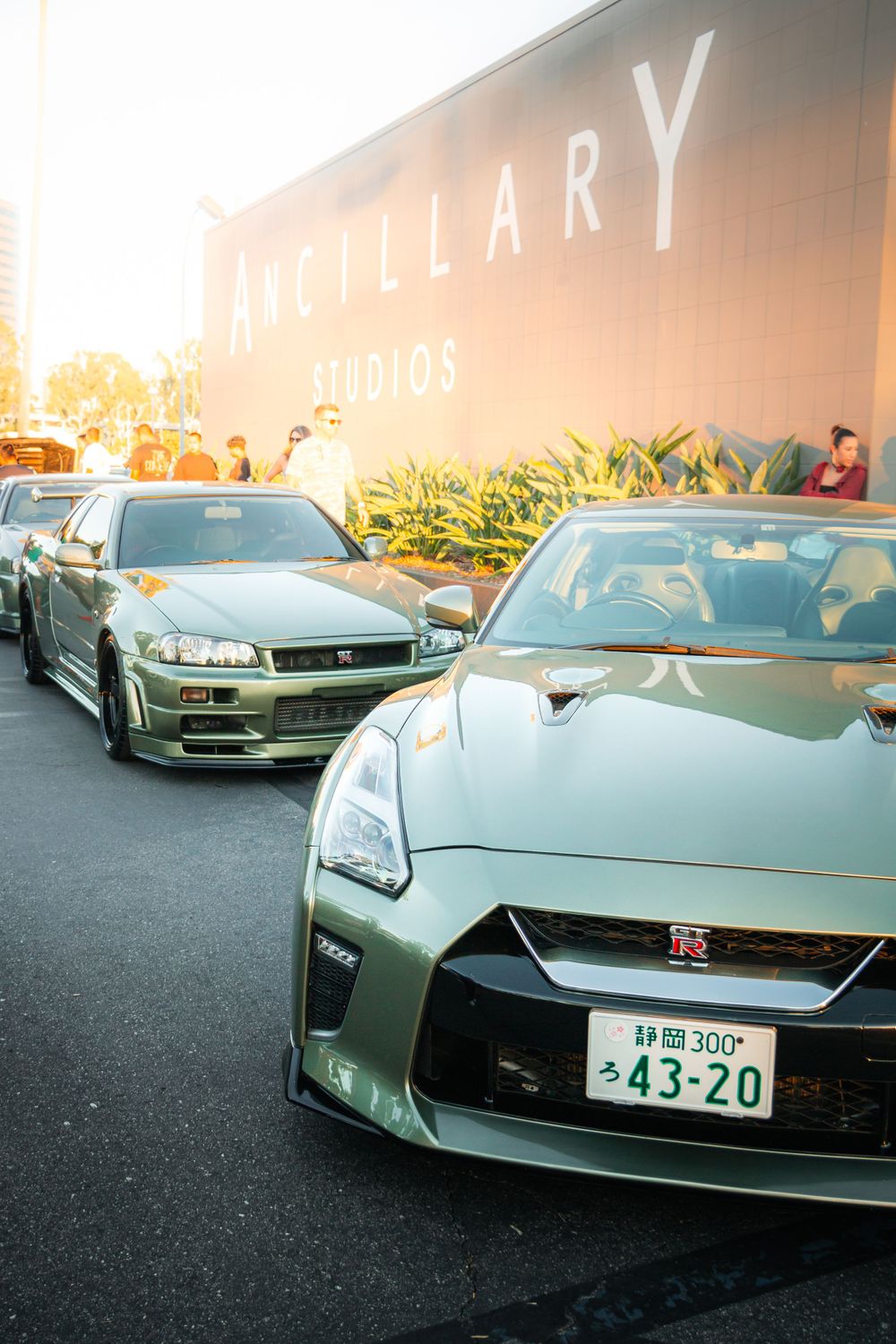 Nissan Skyline GTR R34, and Nissan GTR R35 - Both in Millenium Jade