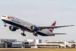 A British Airways Boeing 777-336ER takes off from Cardiff International Airport in Wales.